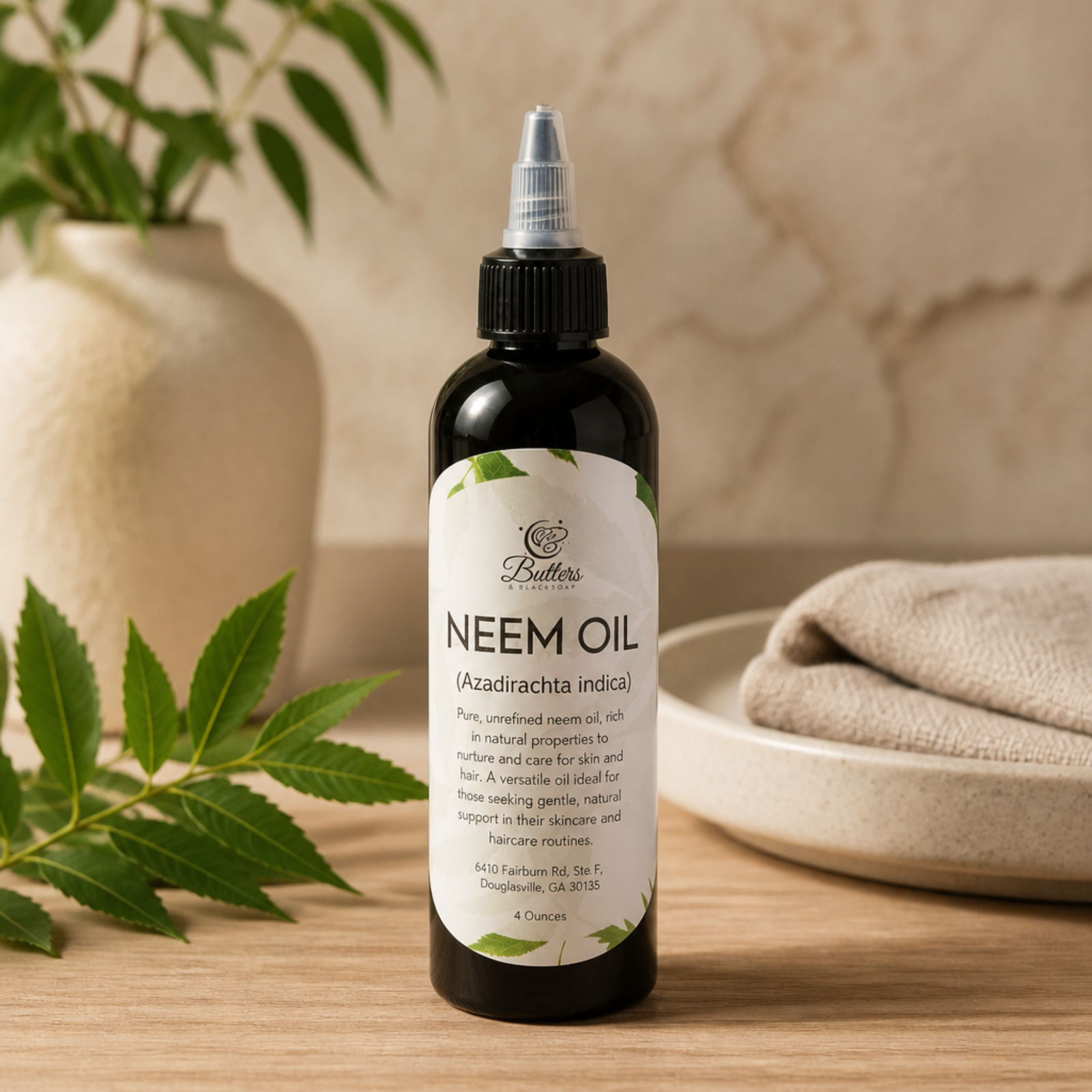Neem oil bottle with label on a white background