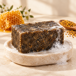 Unwrapped African black soap with gentle lather and honey accents