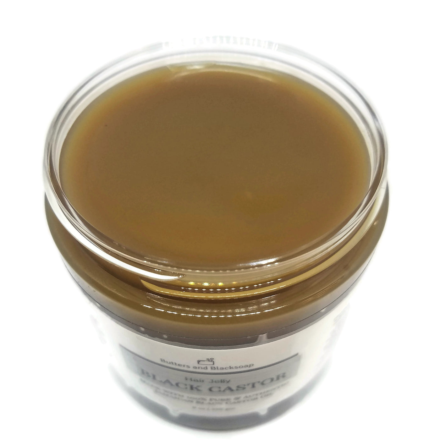 open jar of black castor hair jelly